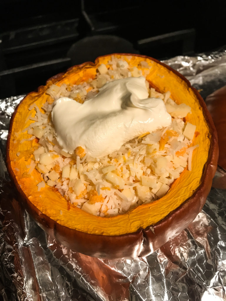 Pumpkin filled with cheese and cream