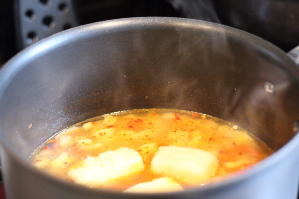 stock simmering in a pan